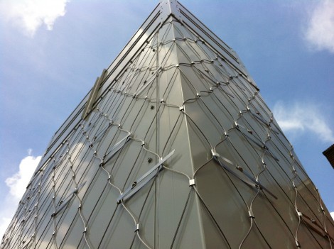 Custom designed stainless steel lattice work for a chimney.